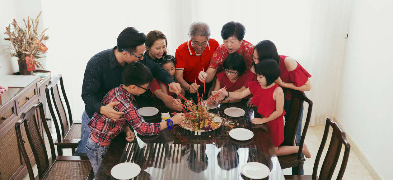 Family enjoying a Lunar New Year reunion dinner